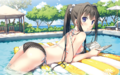 Yoko swimming and reading.
